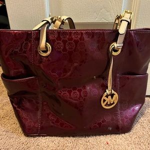 Michael Kors Jet Set Metallic Burgundy and Gold Tote Bag